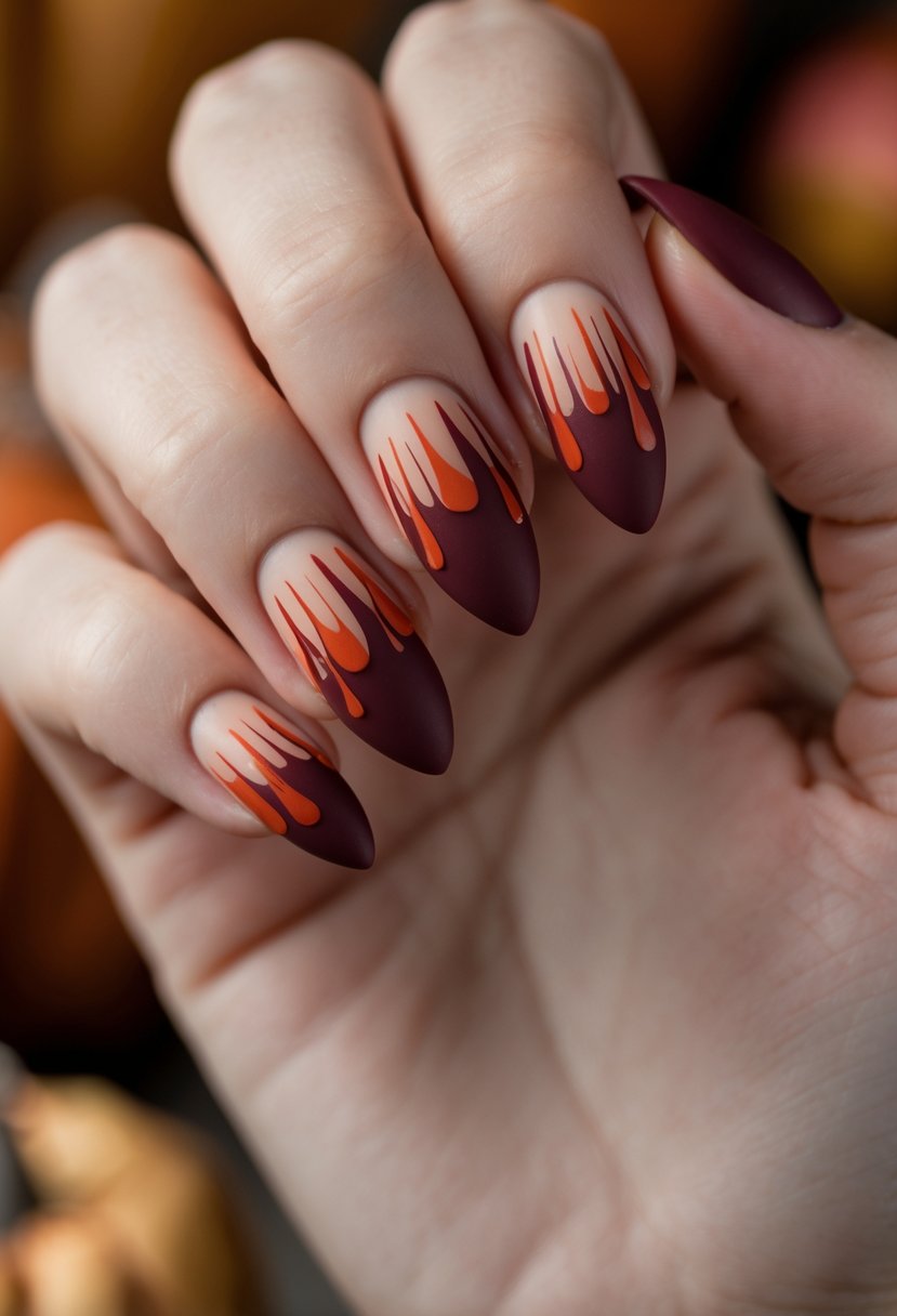 Close-up of a hand with red drip nail art on medium-length nails against a soft blurred background.