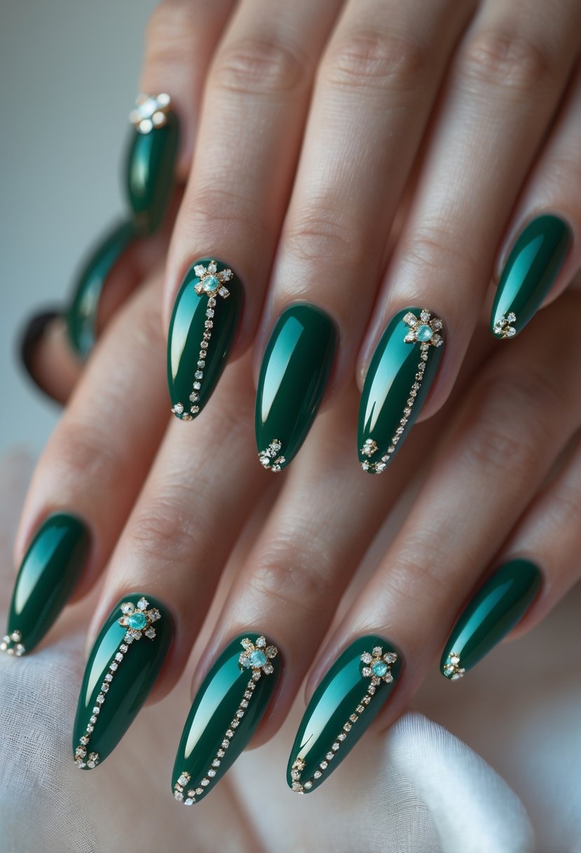 Close-up of a hand with glossy emerald green nails decorated with tiny gems and drip designs.