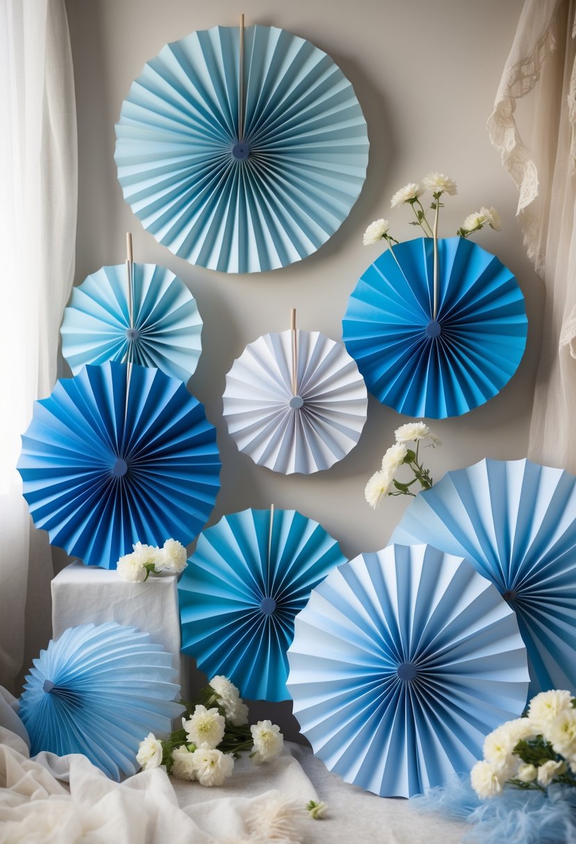Blue ombre paper fans arranged as bridal shower decorations with white flowers and soft lighting.