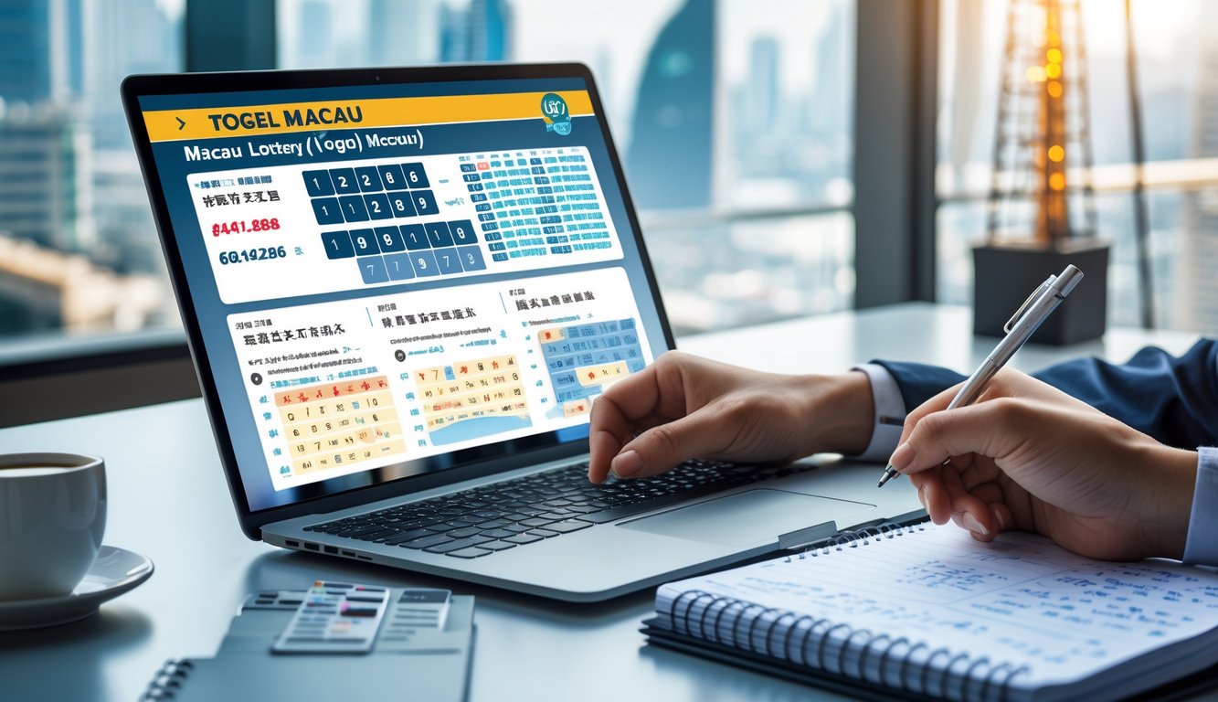 Meja kerja dengan laptop menampilkan grafik angka, buku catatan dengan tulisan tangan, dan dekorasi kecil bertema Macau.