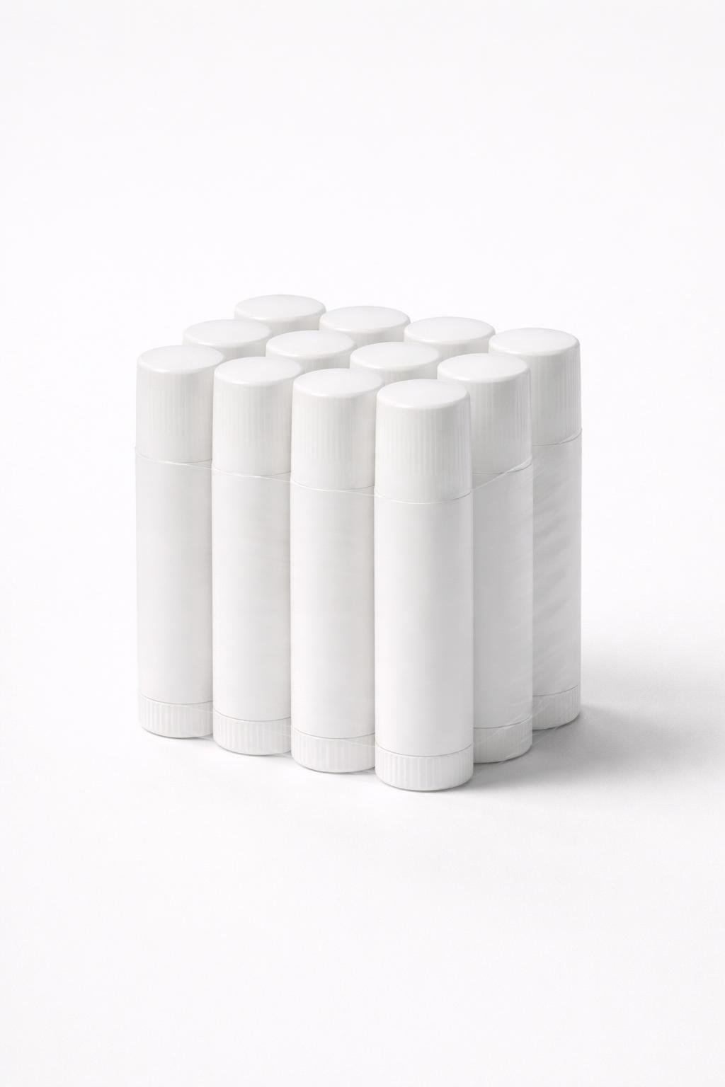 A group of white lip balm tubes tightly shrink-banded together on a plain background.