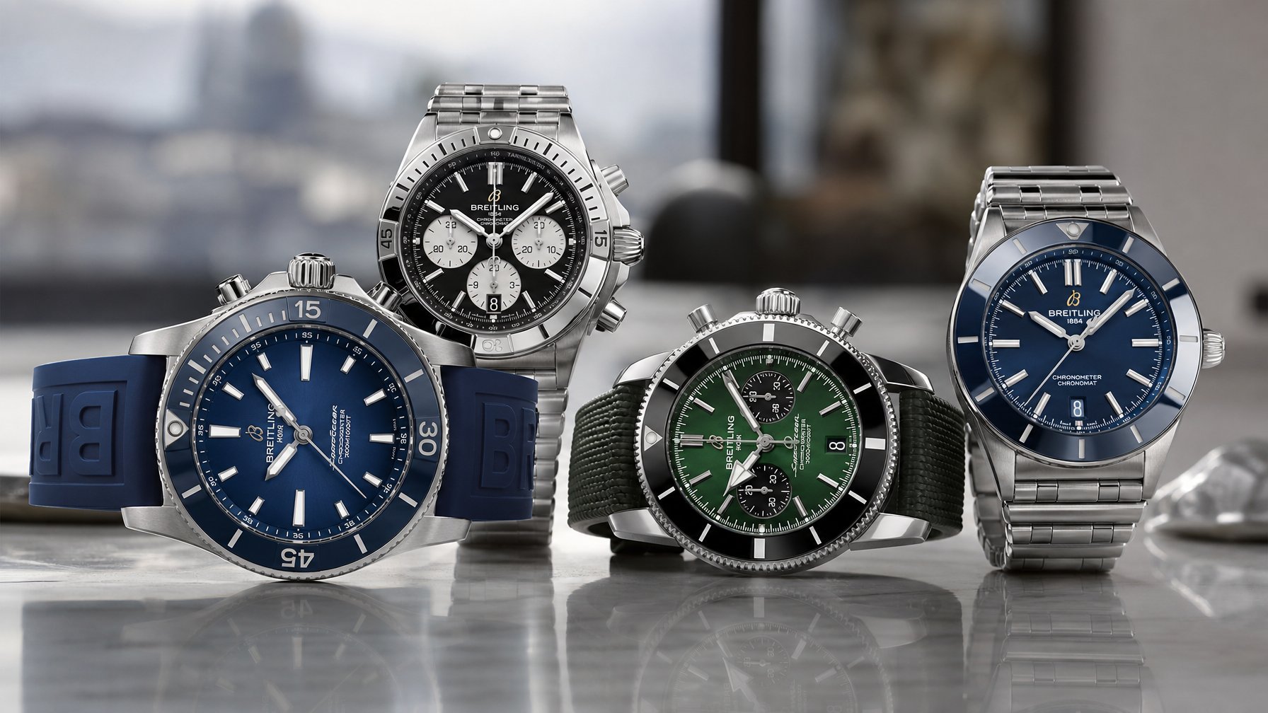 Beberapa jam tangan Breitling populer tahun 2026 ditampilkan di atas permukaan reflektif dengan latar belakang buram.