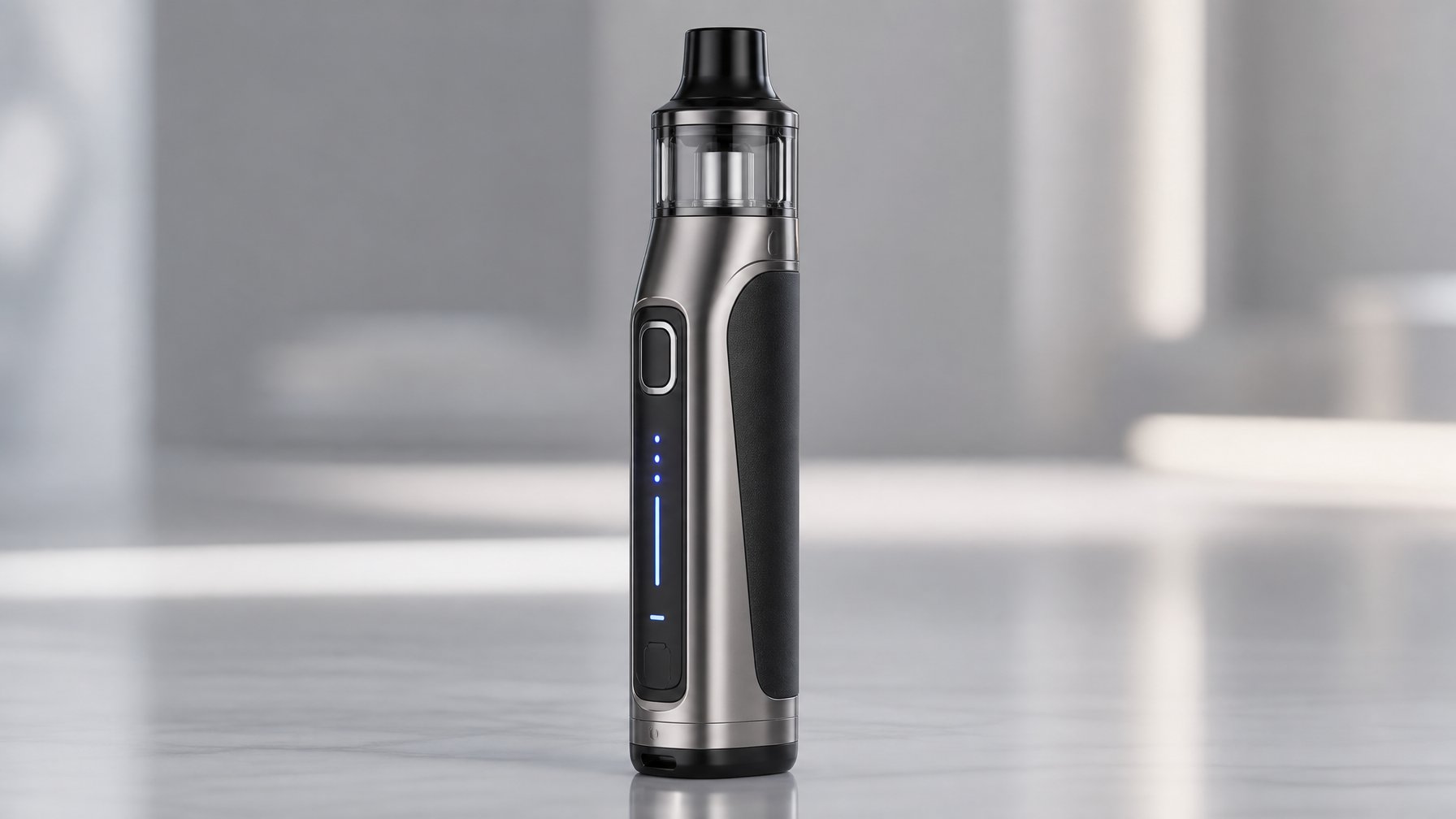 Perangkat vape modern berdiri tegak di atas permukaan reflektif dengan latar belakang minimalis.