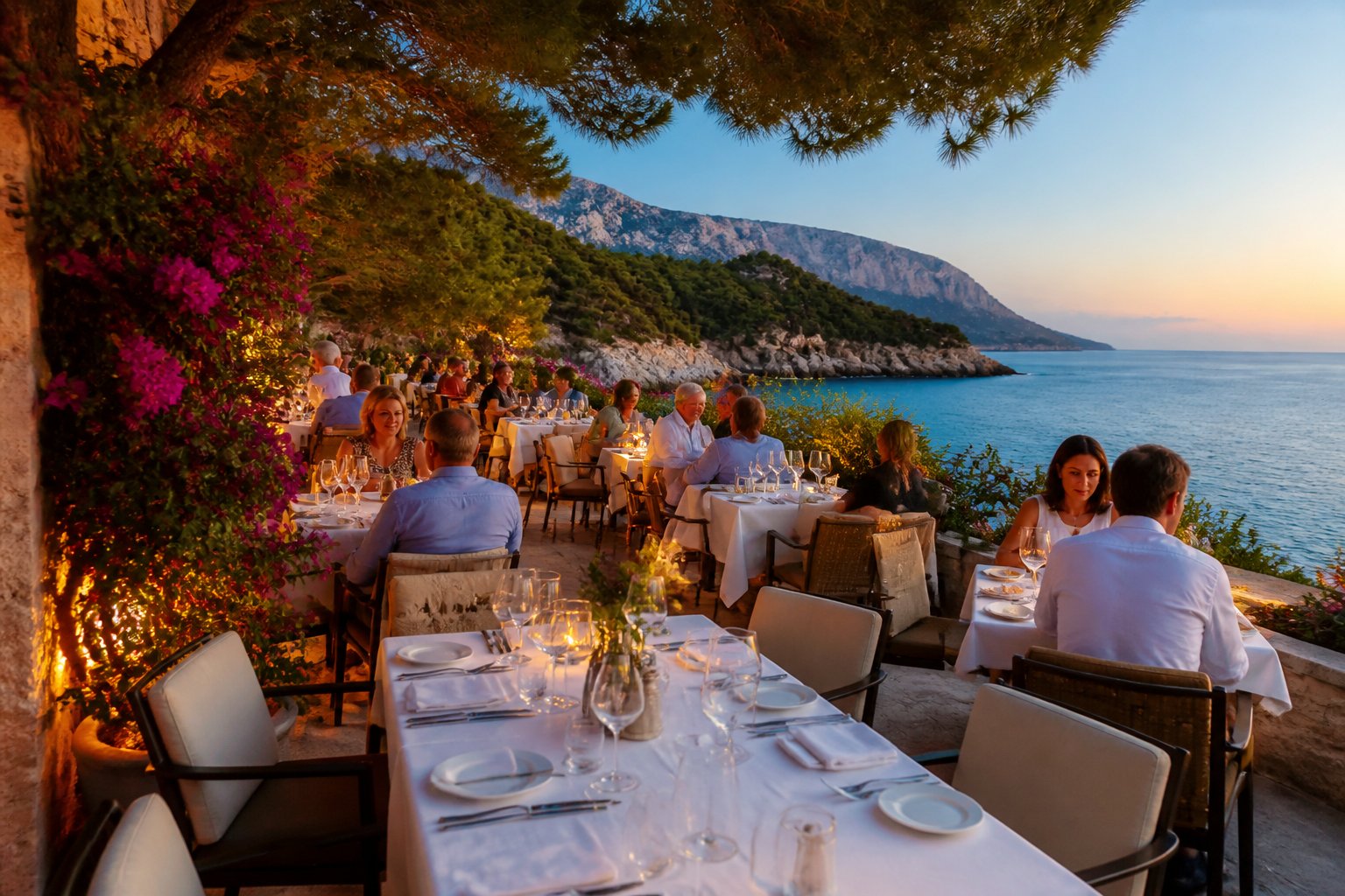 Vanjski dio restorana s pogledom na more i gostima koji uživaju u obroku na otoku Braču.