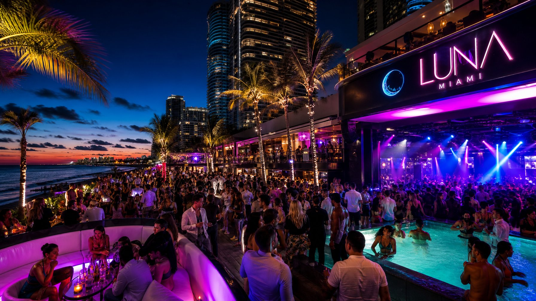 Suasana malam yang ramai di klub malam dan beach club populer dengan lampu warna-warni, orang-orang menari dan bersosialisasi di luar ruangan dekat pantai.