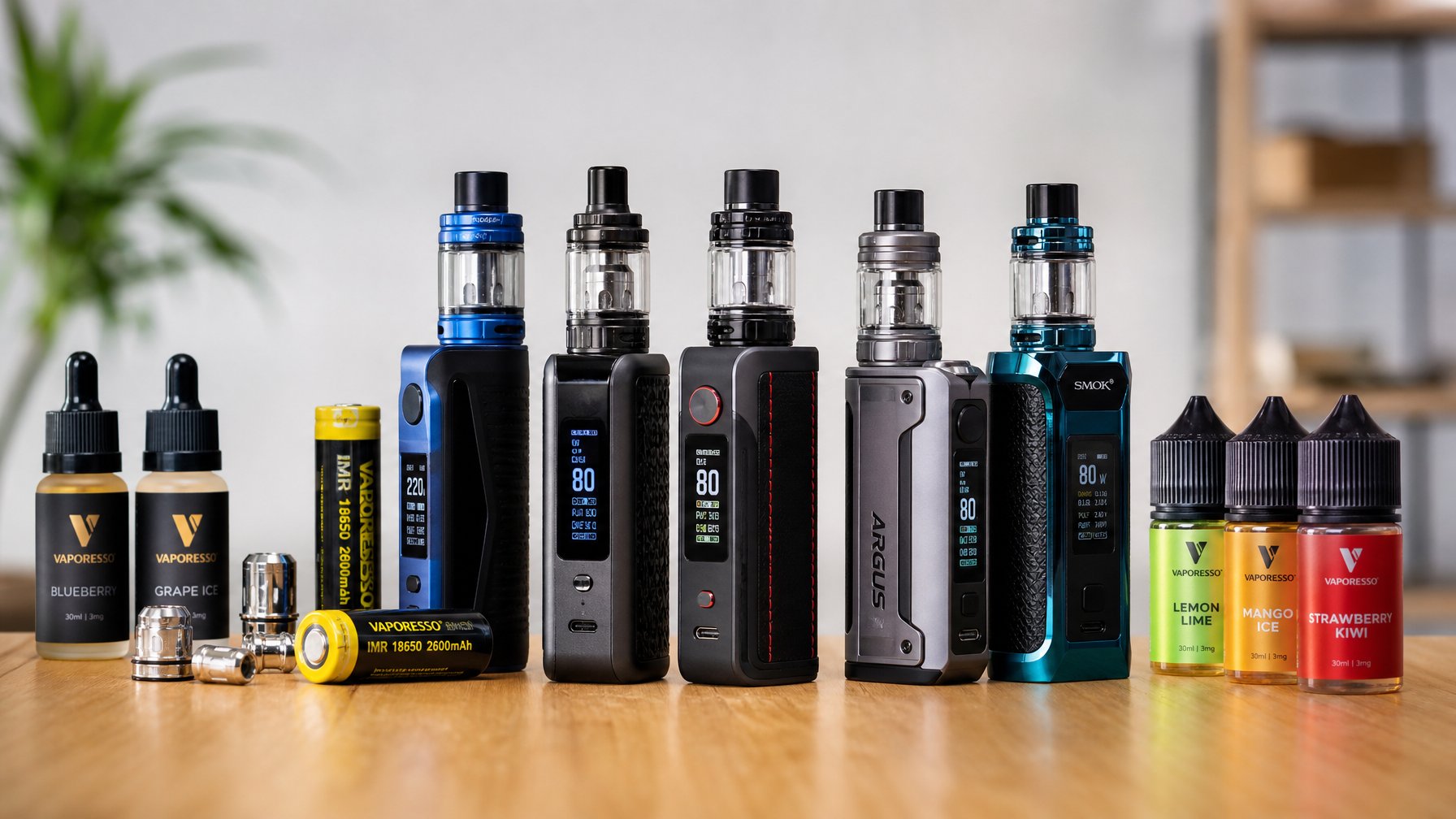 Meja dengan beberapa perangkat vape MOD terbaru dan aksesorisnya yang tertata rapi.