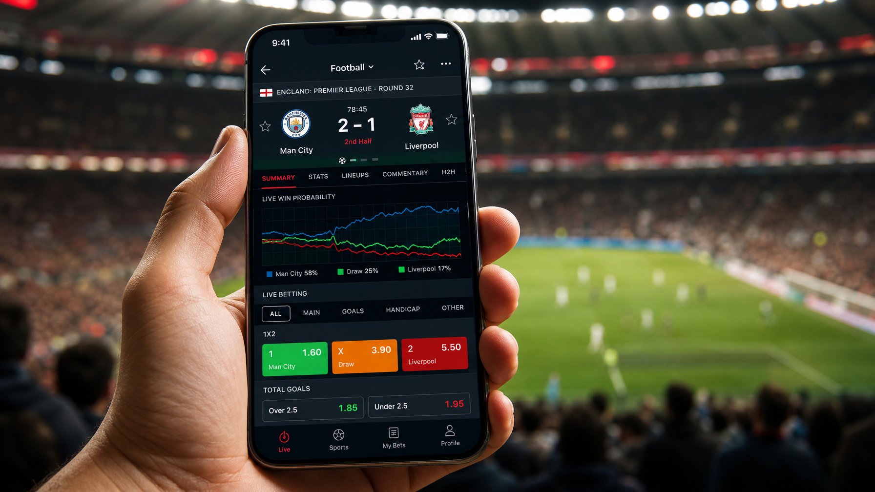 Seseorang memegang ponsel yang menampilkan aplikasi skor sepak bola dan pasar taruhan terbaru dengan latar belakang stadion olahraga yang ramai.