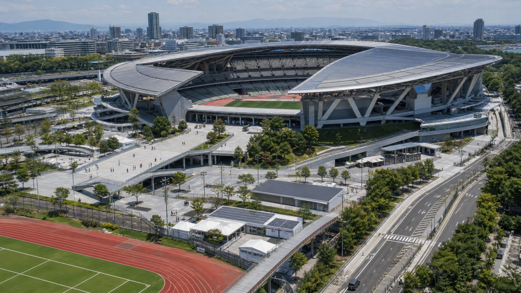 Stadion olahraga modern yang luas di Jepang dengan fasilitas pendukung dan akses transportasi yang tertata.