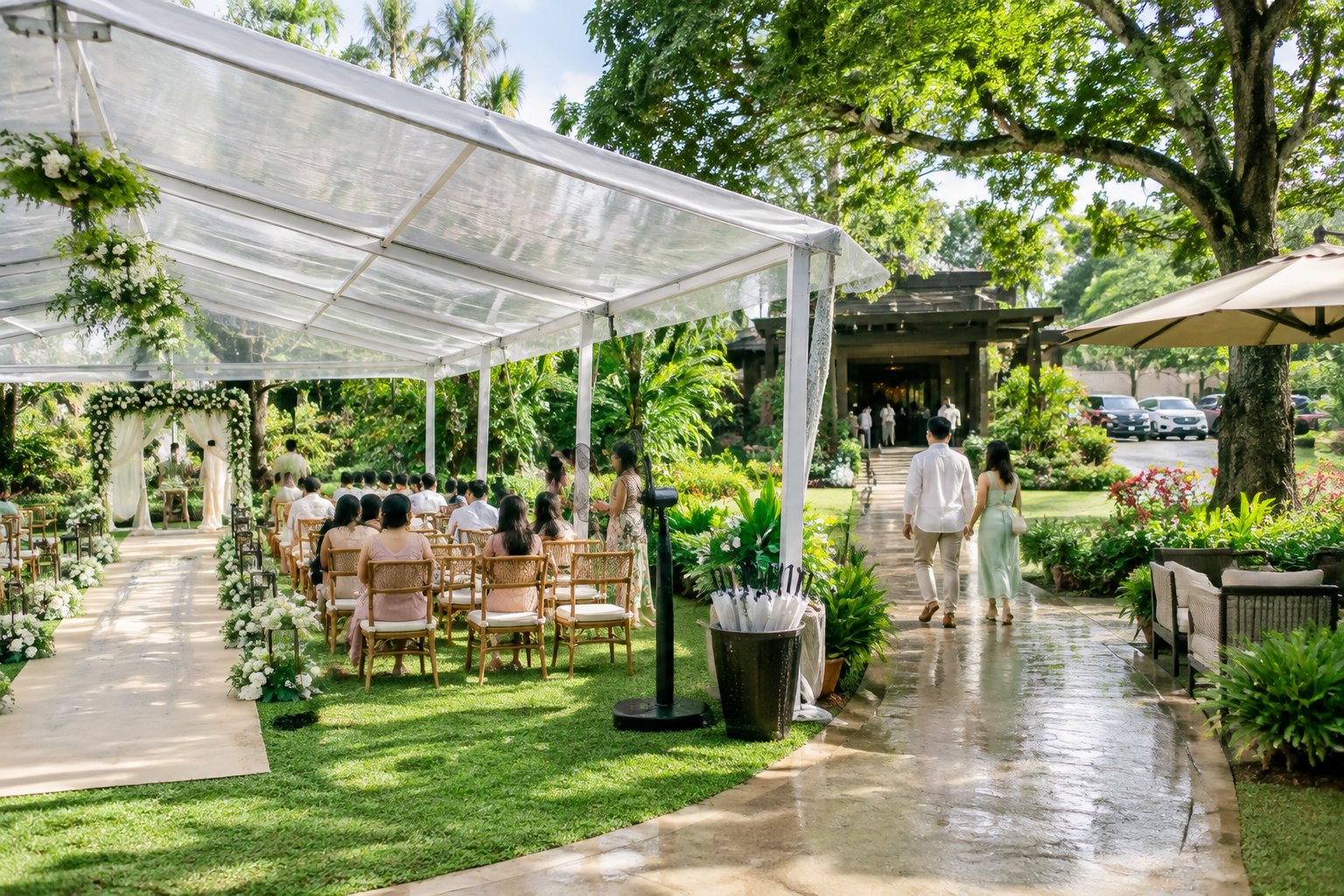 Guests gather comfortably at a tropical garden wedding venue with covered seating, umbrellas, and an accessible entrance.