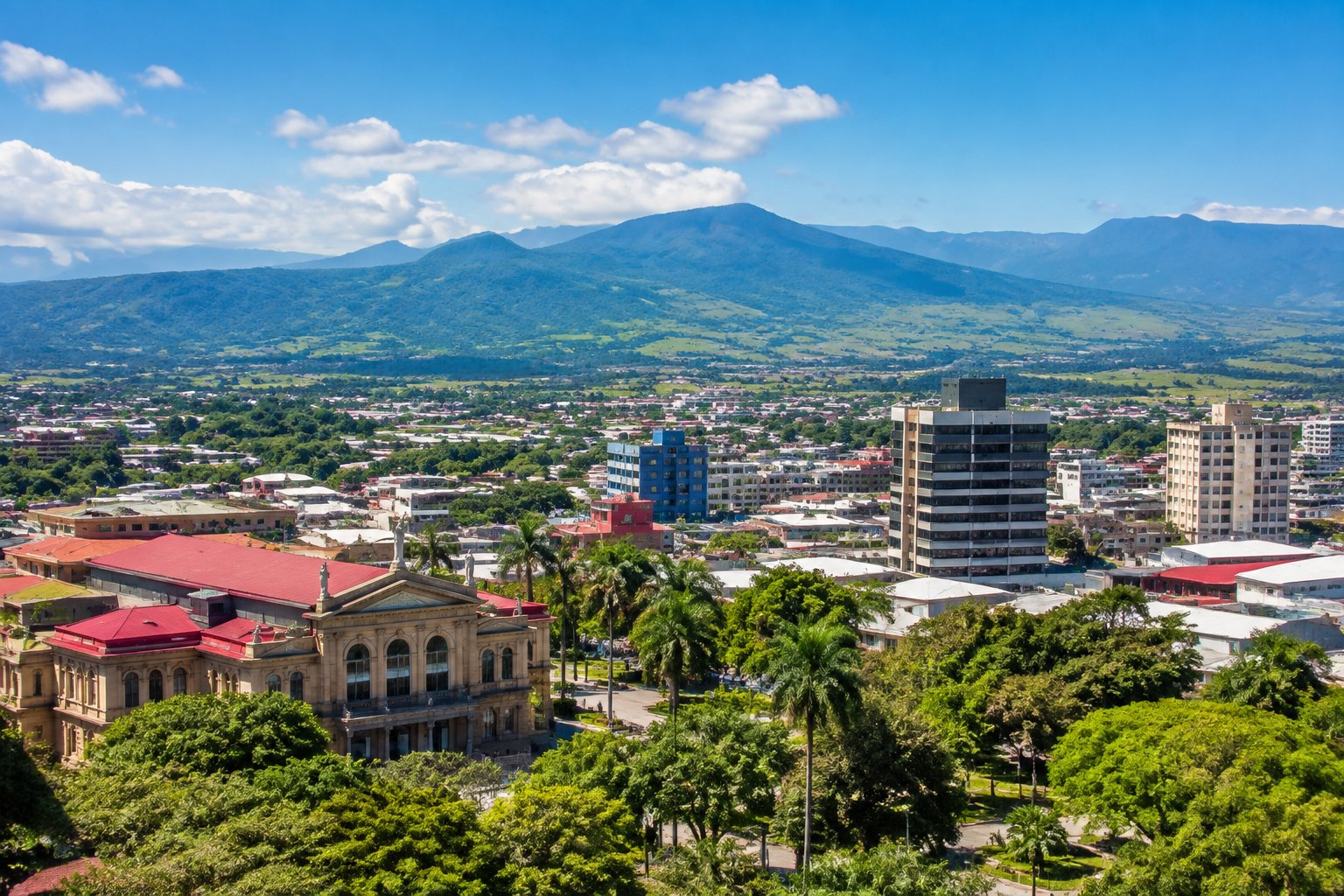 San José spreads across the green Central Valley beneath distant mountain ridges.