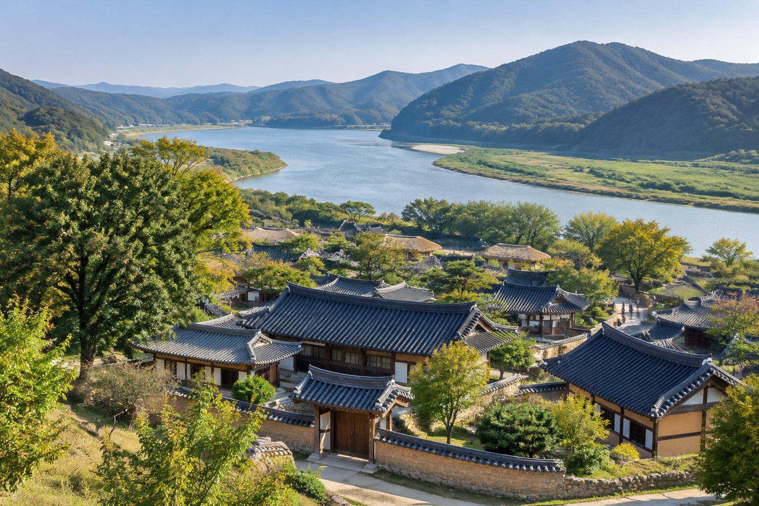 Traditional hanok houses at Hahoe Folk Village beside the Nakdong River and green hills.