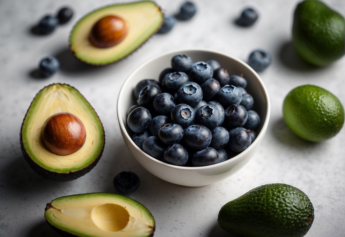 A bowl of blueberries and avocado placed side by side on a clean, white surface