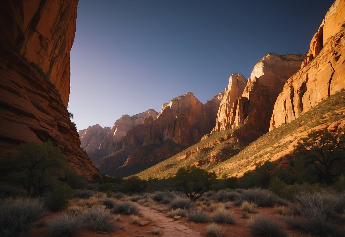 Sunset over towering red rock formations in Zion National Park, Utah, with winding trails leading through rugged terrain