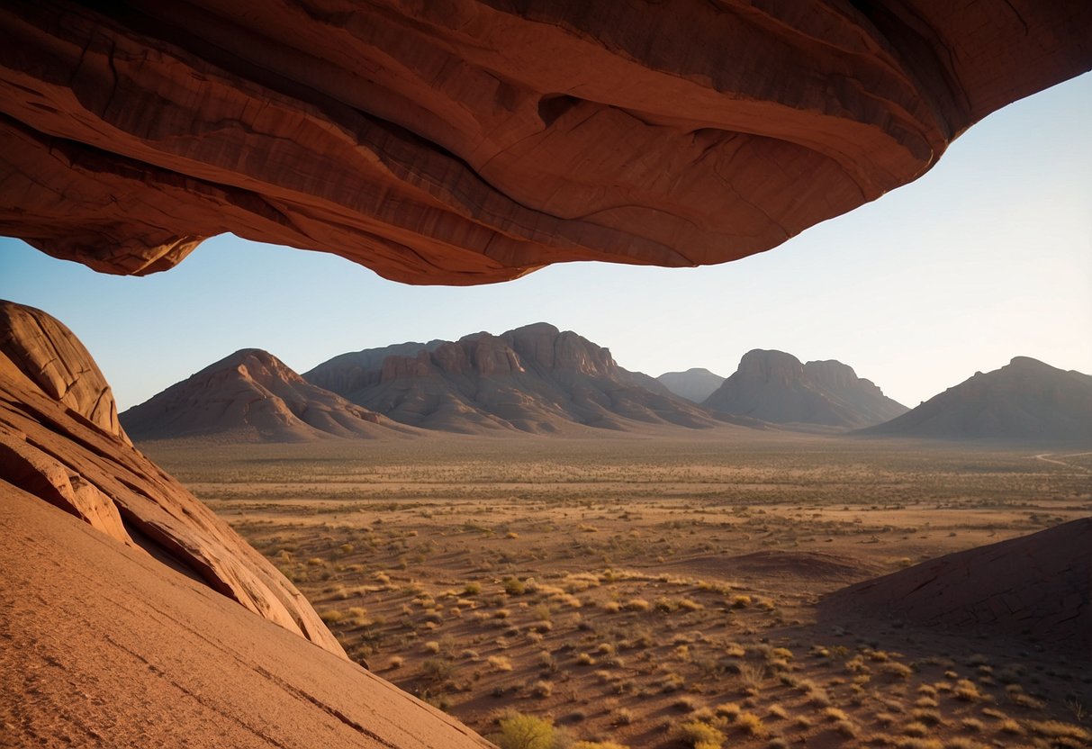 Vast red sandstone formations, rugged mountains, and unique desert-adapted wildlife in Damaraland, Namibia