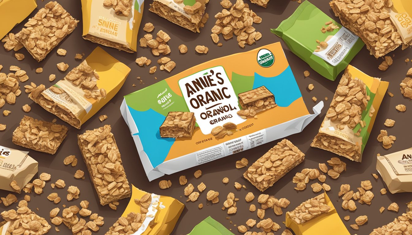 A pile of Annie's organic granola bars spilling out of a torn open box, surrounded by empty wrappers