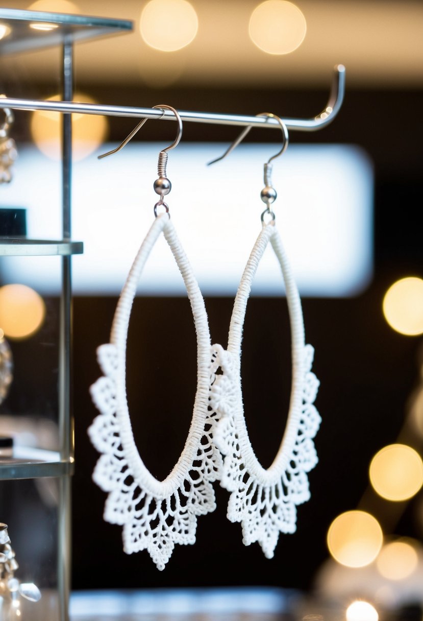 Delicate white lace-inspired earrings suspended from a display, with soft lighting to highlight intricate details