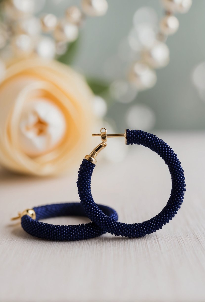 A close-up of navy beaded hoop earrings against a soft, elegant background, with delicate details and a sense of sophistication