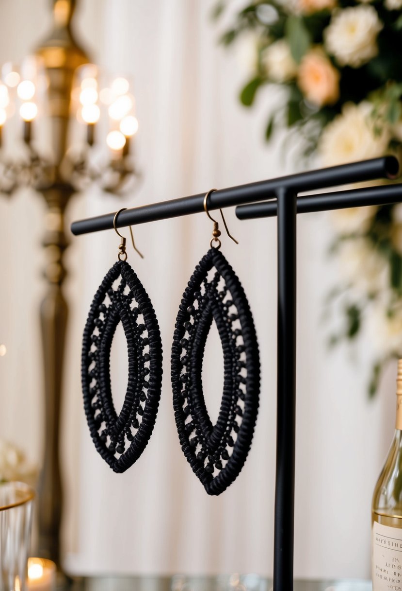 Black macramé earrings hanging on a display with elegant wedding decor in the background