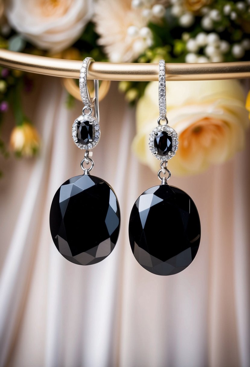 A pair of elegant black onyx danglers, sparkling under soft lighting, against a backdrop of luxurious fabric and floral arrangements