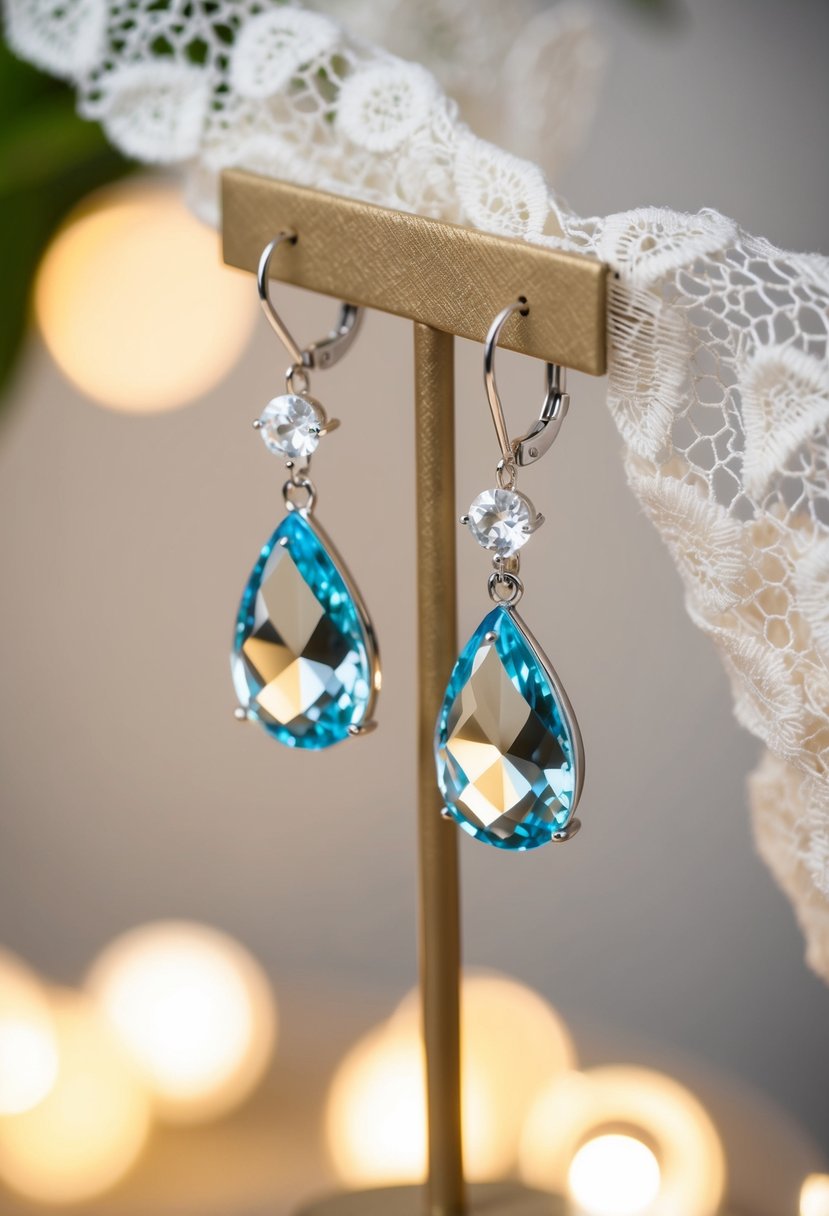 Teardrop crystal earrings dangling from a jewelry stand, surrounded by soft lighting and delicate lace fabric