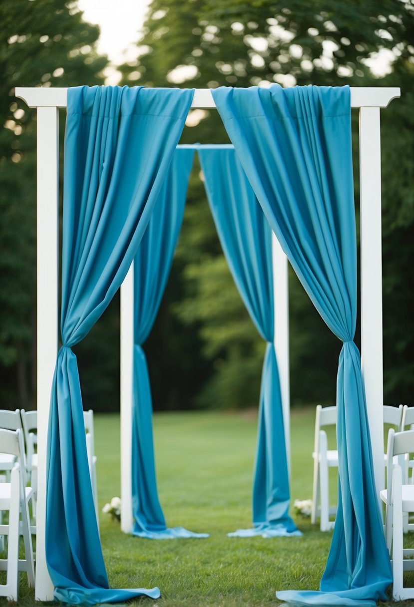 A slate blue drapery billows gently in the breeze, framing a serene outdoor wedding ceremony