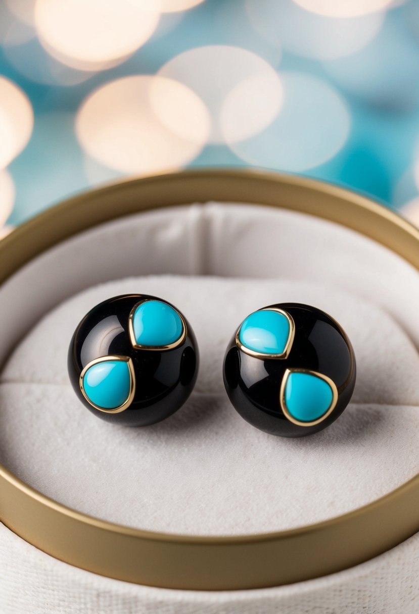 Two synthetic black vulcanite earrings with turquoise stones, displayed on a white velvet background