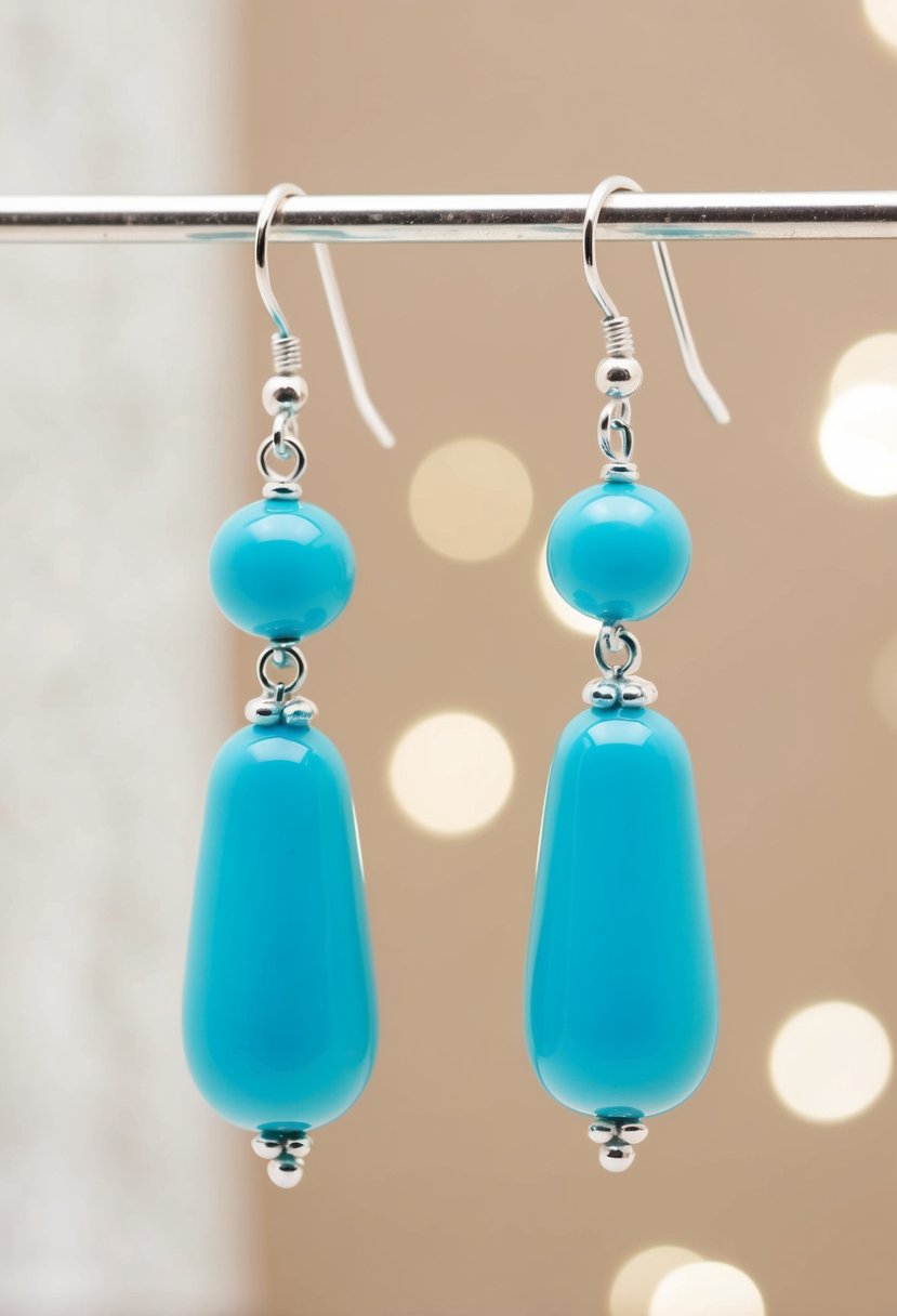 A close-up of turquoise beaded drop earrings against a soft, neutral background