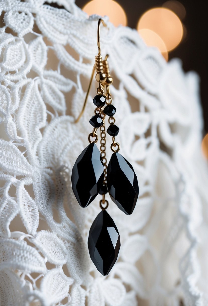 A close-up of black crystal dangle earrings against a white lace background, with soft lighting to highlight the intricate details