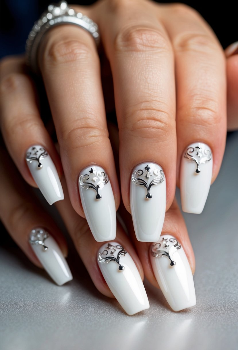 A close-up of chrome white finished nails with intricate wedding designs